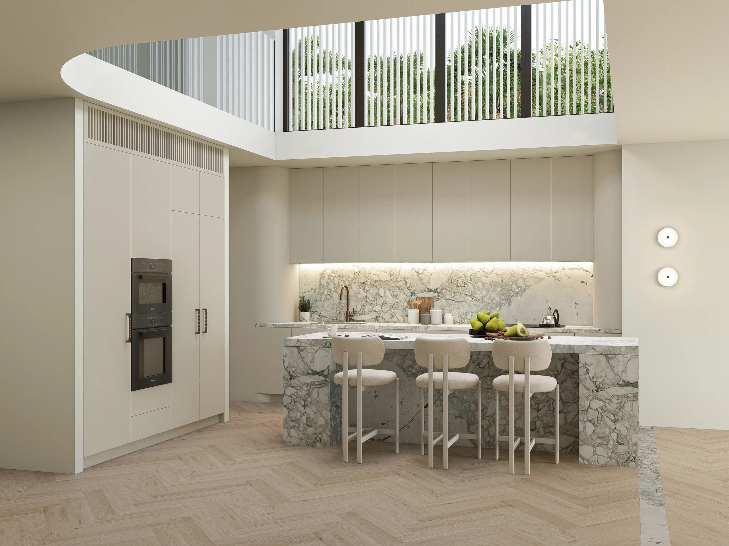 Kitchen at Ecru with a sculpted stone island, warm timber joinery and rippled glass pantry doors