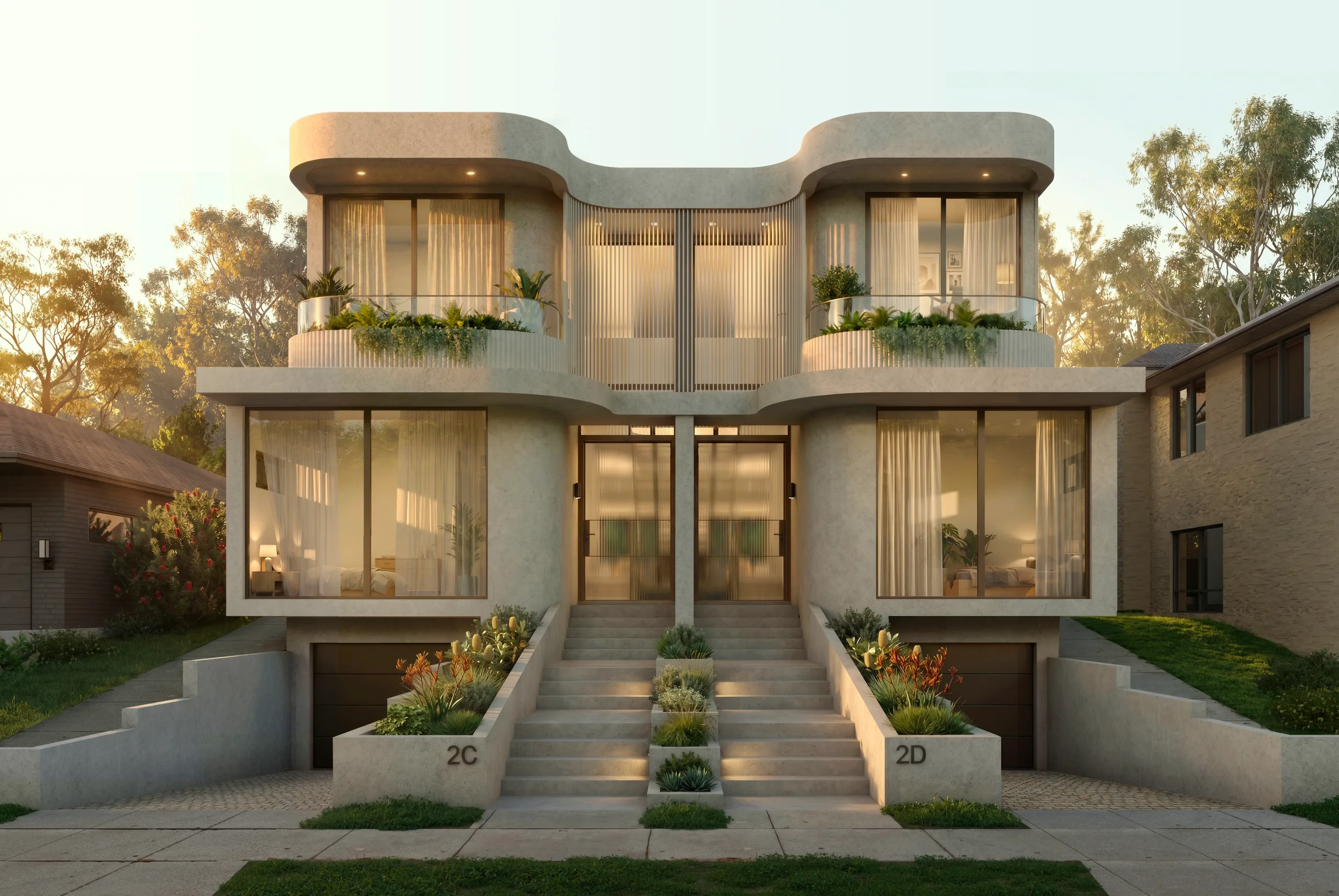 Street elevation of Ecru, curved limestone duplex residences in Bondi with rounded balconies and garden entry stairs